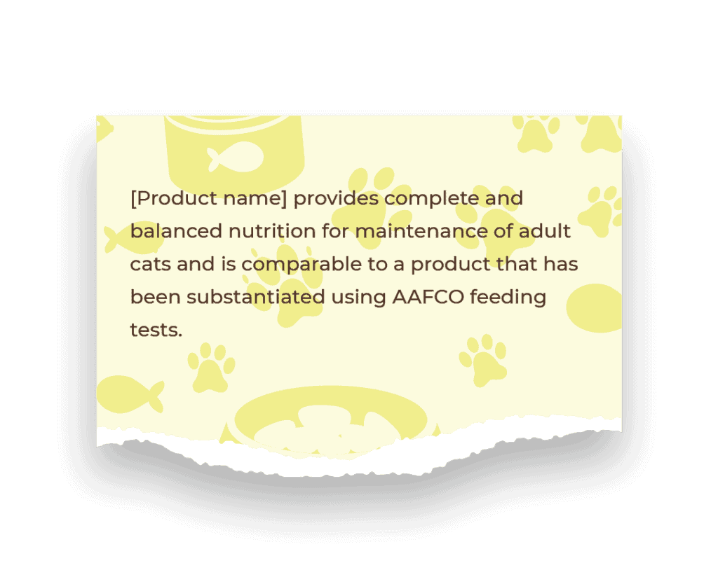 A yellow piece of paper with a background pattern of fish and pawprints has a torn bottom edge. The paper scrap reads: [Product name] provides complete and balanced nutrition for maintenance of adult cats and is comparable to a product that has been substantiated using AAFCO feeding tests.